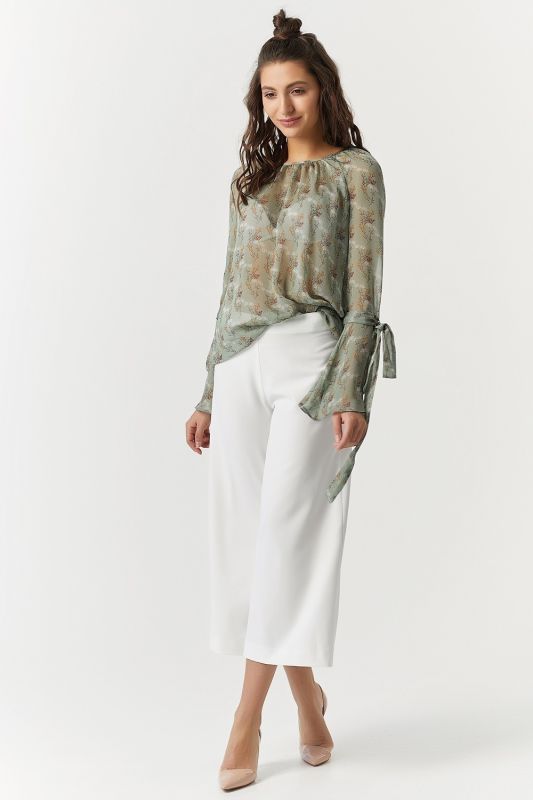 Transparent chiffon blouse with floral print on green