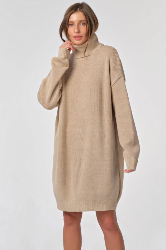 Warm knitted sweater dress with short cream color