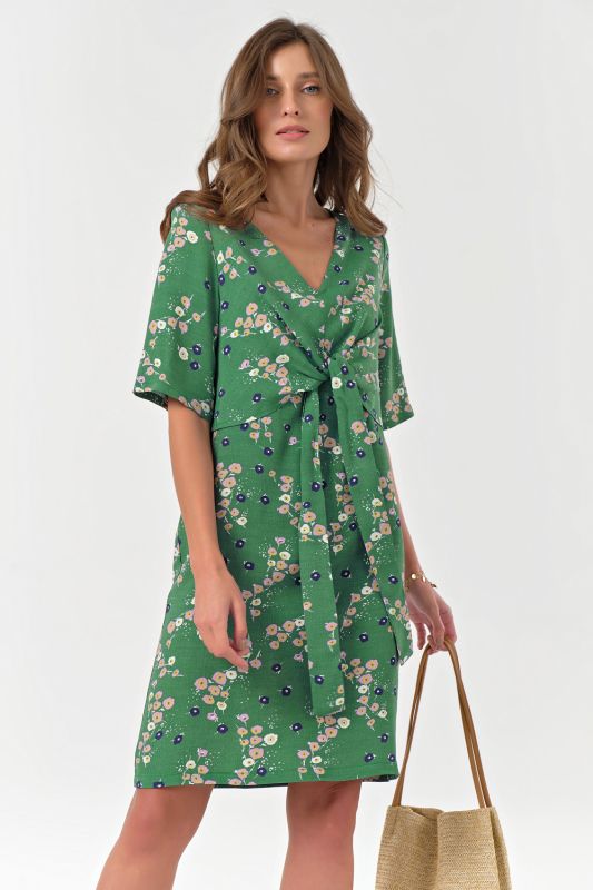 Summer fitted dress with print on green