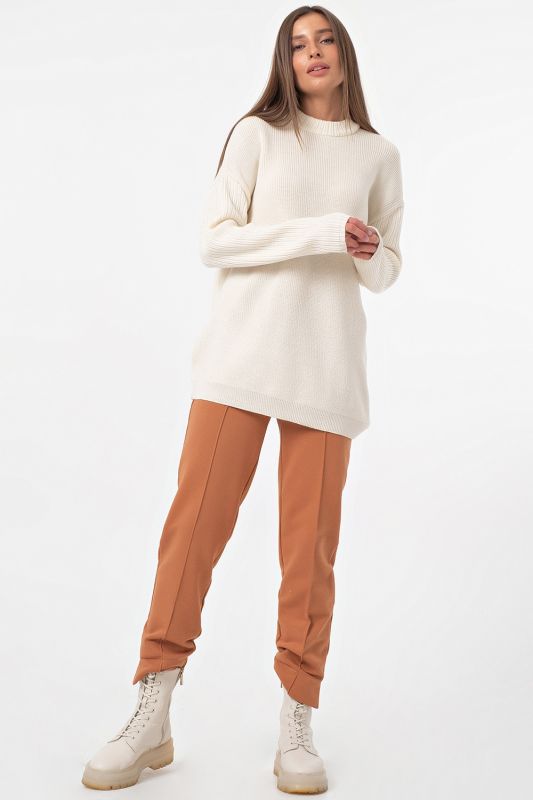 Long asymmetric warm asymmetrical knitted sweater in milk color