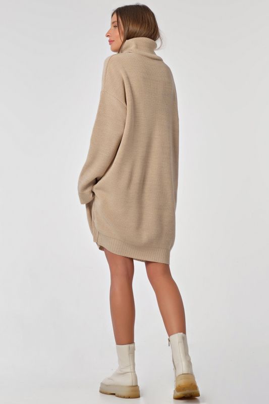 Warm knitted sweater dress with short cream color