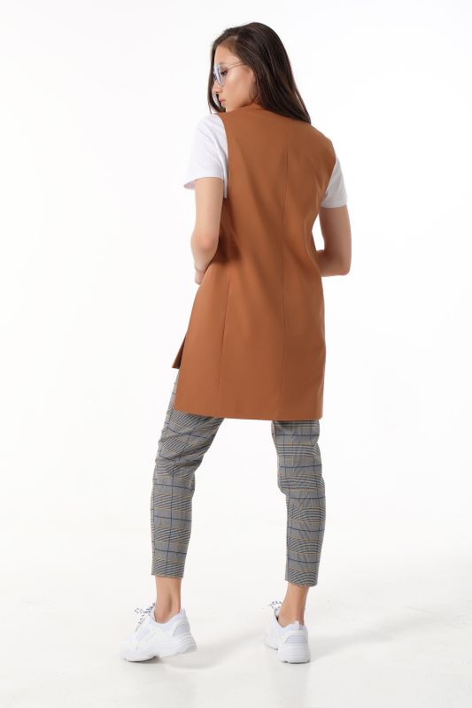 Long straight vest with slits on the sides made of almond suit fabric