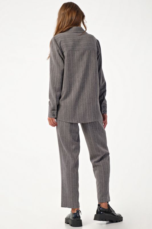 Oversize pants suit with striped shirt on gray