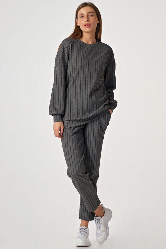 Loose knit suit with pants on gray