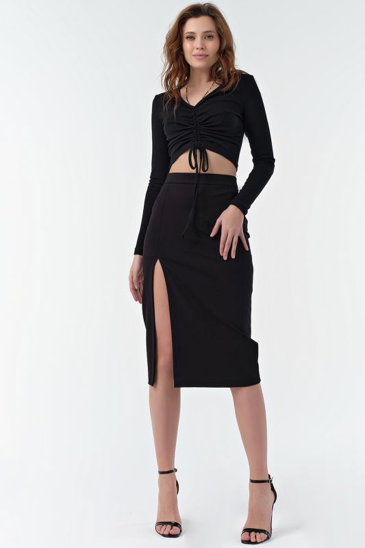 Black knitted pencil skirt with leg slit