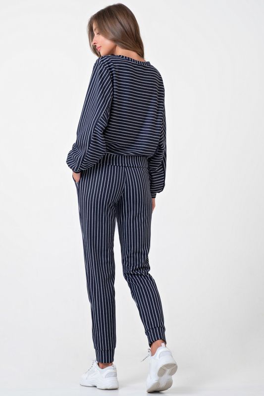 Casual suit with striped knitwear pants on navy blue