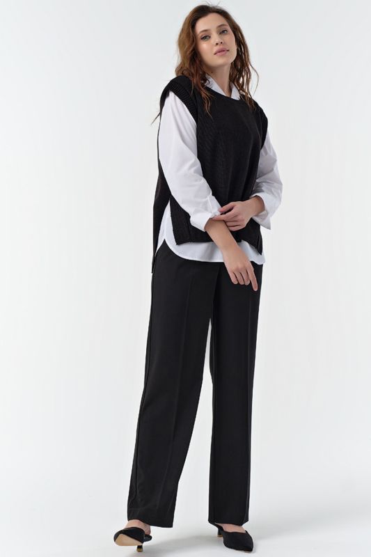 Asymmetric knitted over-size vest with slits on the sides black