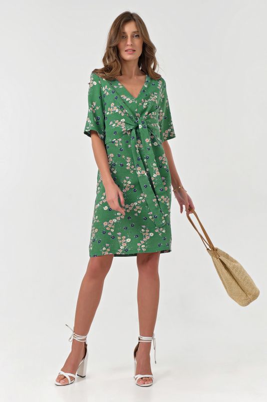 Summer fitted dress with print on green