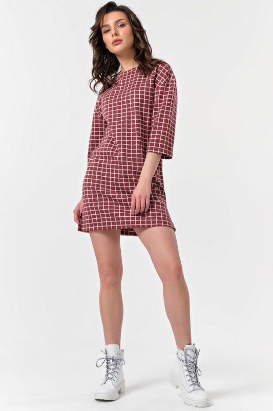 Short plaid knitted dress on burgundy