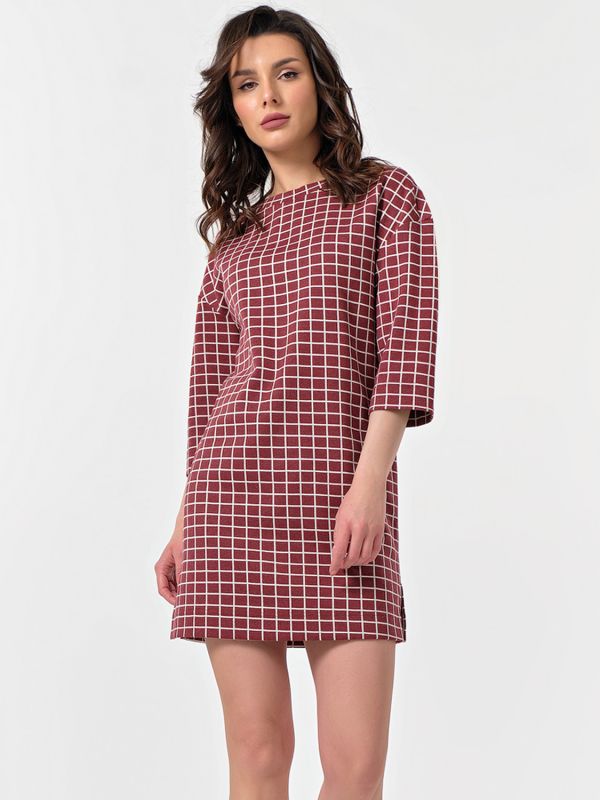 Short plaid knitted dress on burgundy