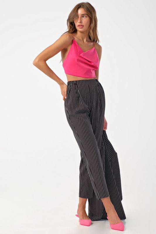 Pants shortened narrowed to the bottom on the elastic band in stripes on black