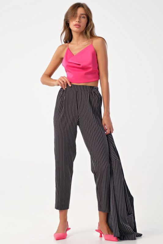 Pants shortened narrowed to the bottom on the elastic band in stripes on black