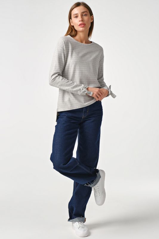 Light cotton striped sweater on gray