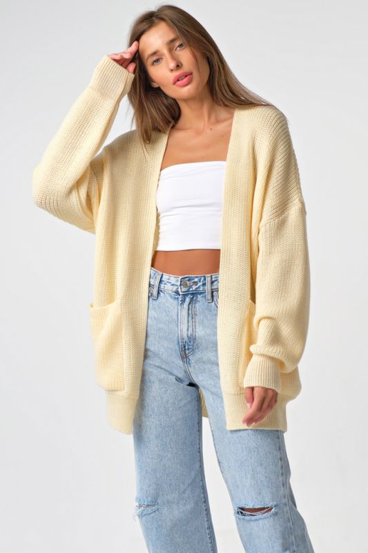 Knitted over-size cardigan short with pockets cream color