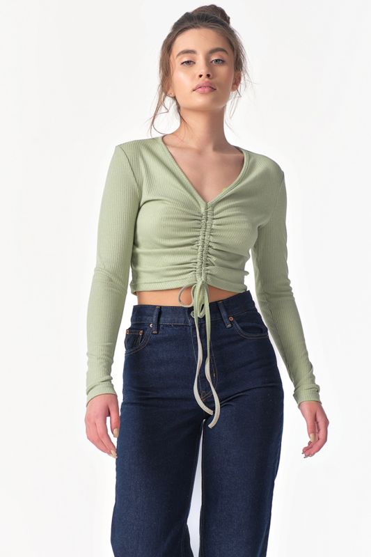 Long-sleeved knitted top with gathering at the front in green